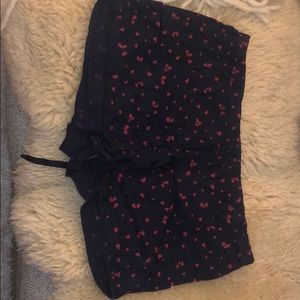 Navy pajama shorts with pink hearts